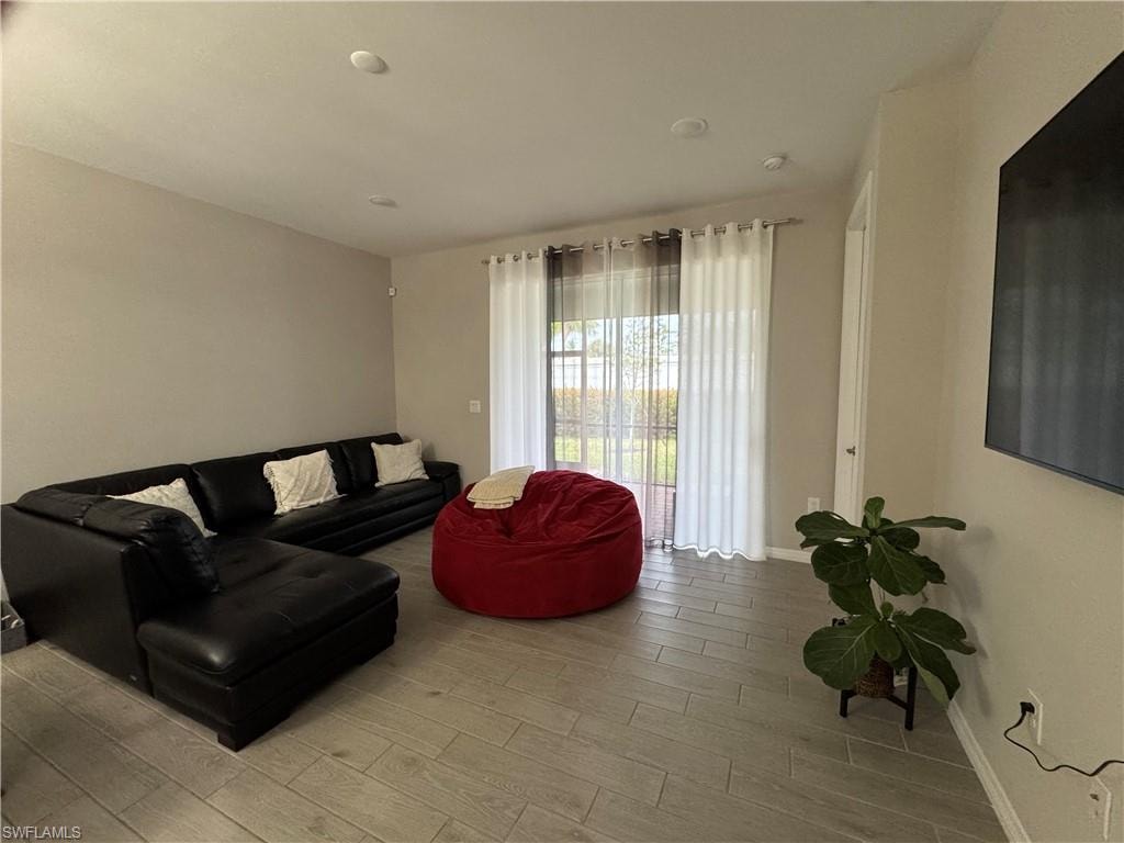 Living room featuring light hardwood / wood-style floors