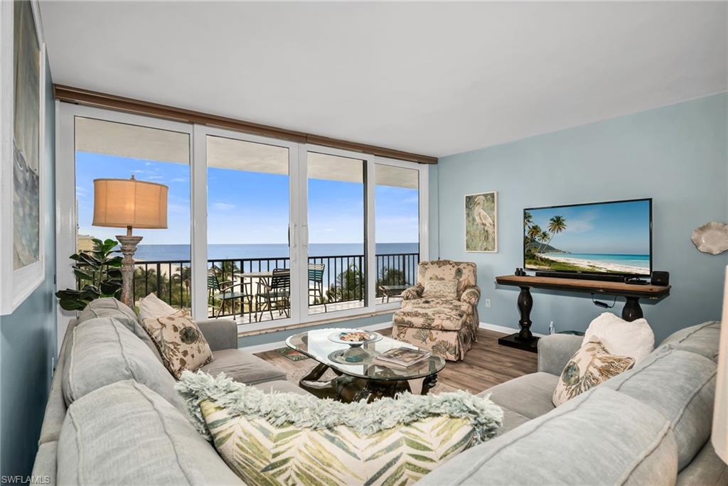 Spacious living area designed to maximize natural light and Gulf views.