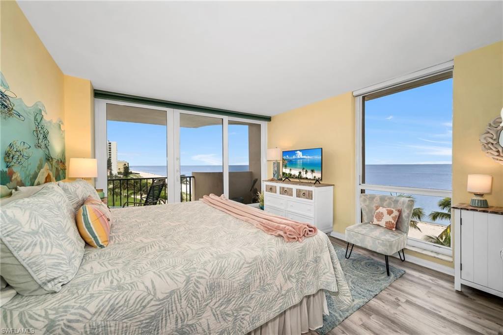 Bright and inviting guest bedroom with spectacular views of Gulf and beach