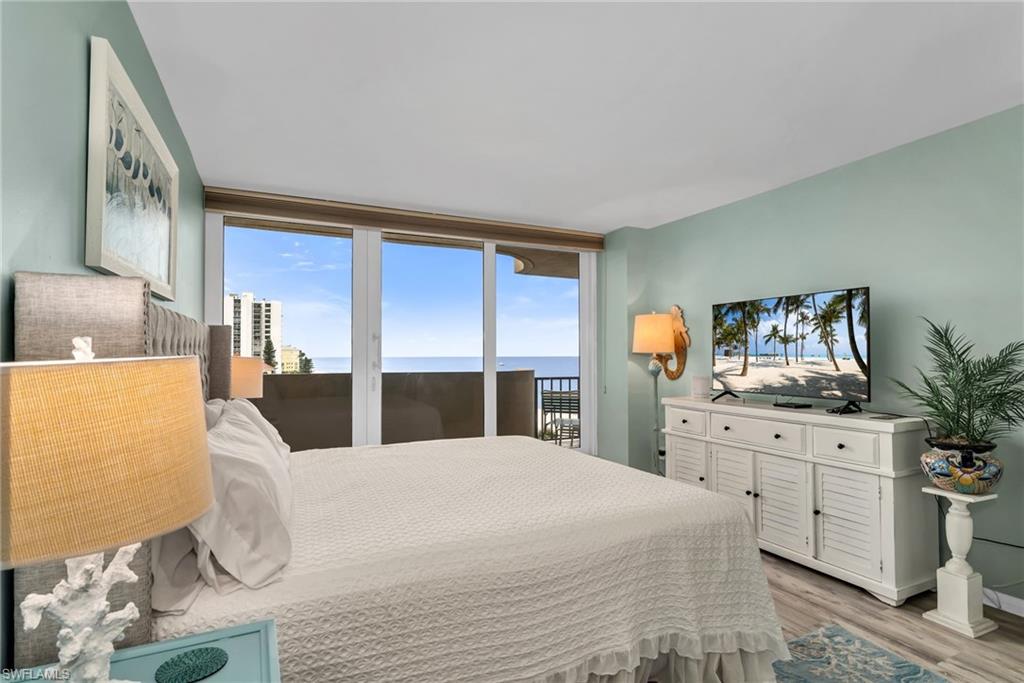 Primary suite offering stunning water views and abundant natural light.