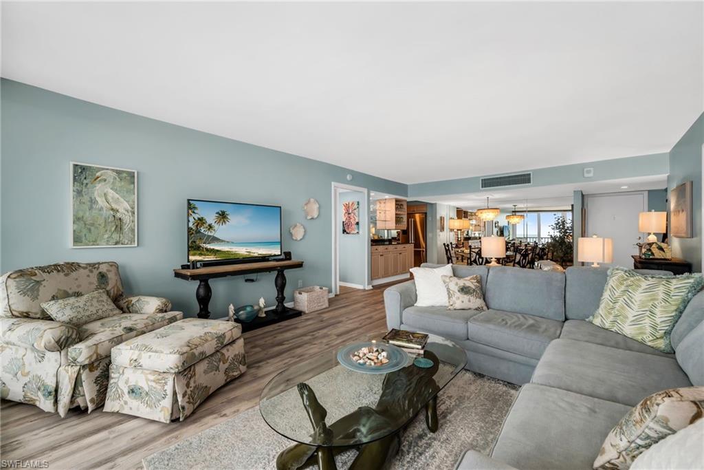 Inviting living room offering a seamless blend of comfort and coastal charm.