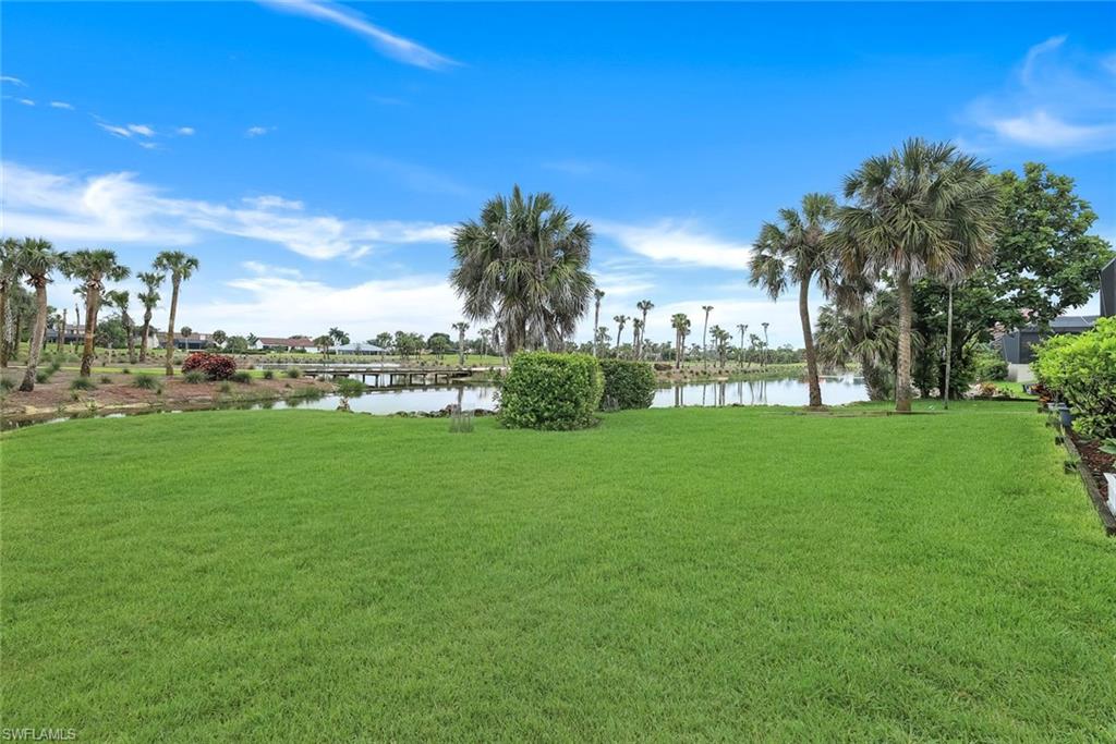 Lovely Rear Yard with Water, Bridge, Golf Course Views of The Bear Championship Golf Course