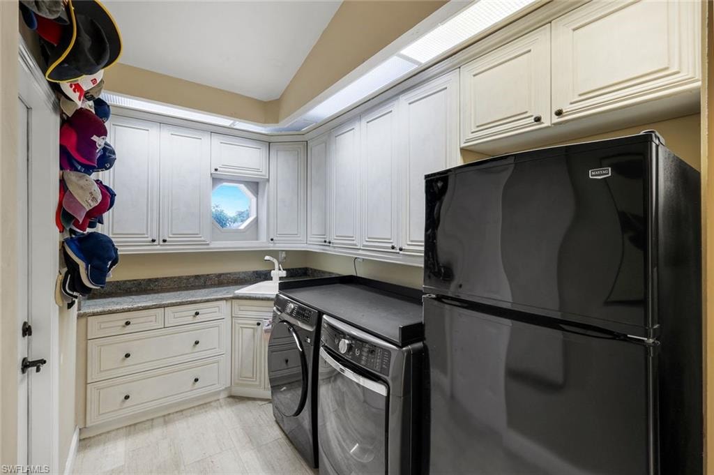 Front Load Washer, Dryer and Extra Fridg. Door to Garage