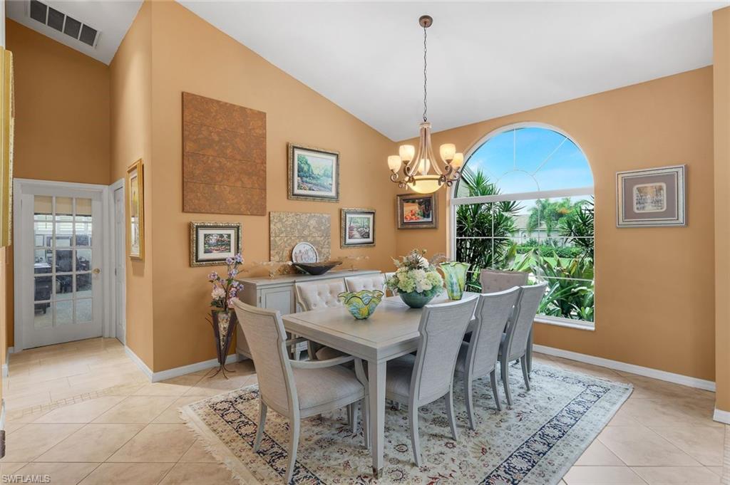 Expandable Dining Area, Tiled High Ceilings, Glass French Door to Den, Laundry Door is to the Right of Den Door