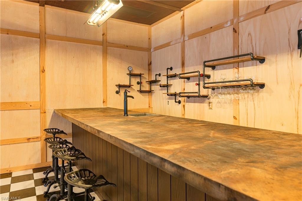 Bar with ice maker and 2 small 'fridges