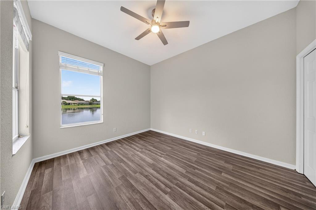 Guest bedroom with a picture-perfect pond view.