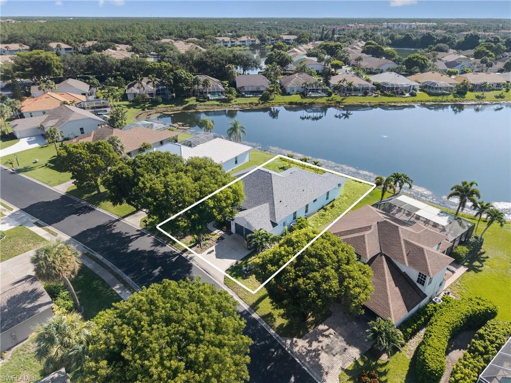 A quarter-acre lot on one of the community's prettiest lakes — pond view, no pool to maintain.