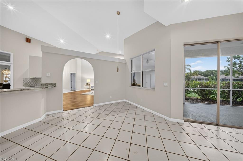 Casual dining nook with pond views and direct lanai access.