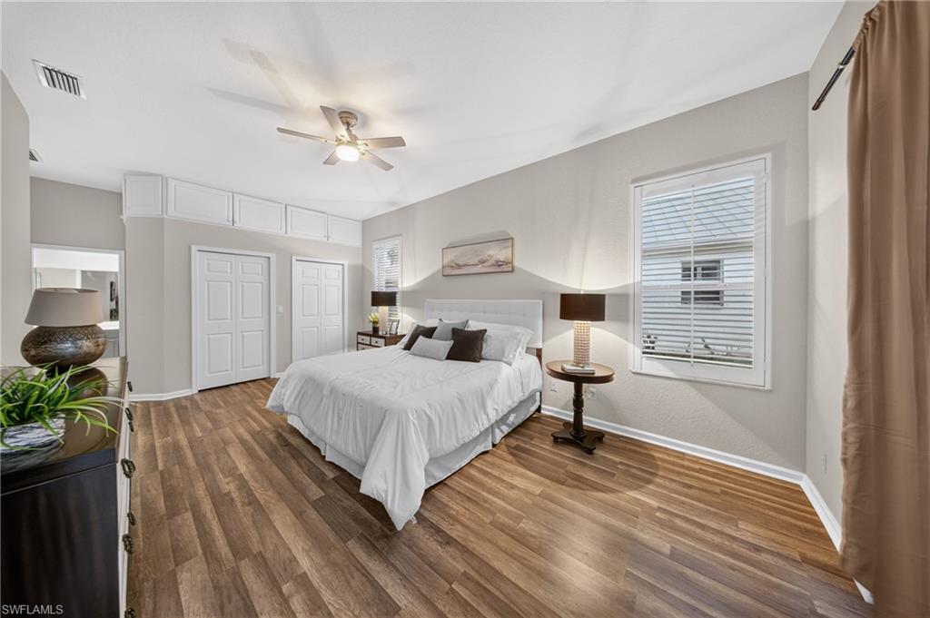 Primary bedroom offers dual closets and a private en-suite entrance.