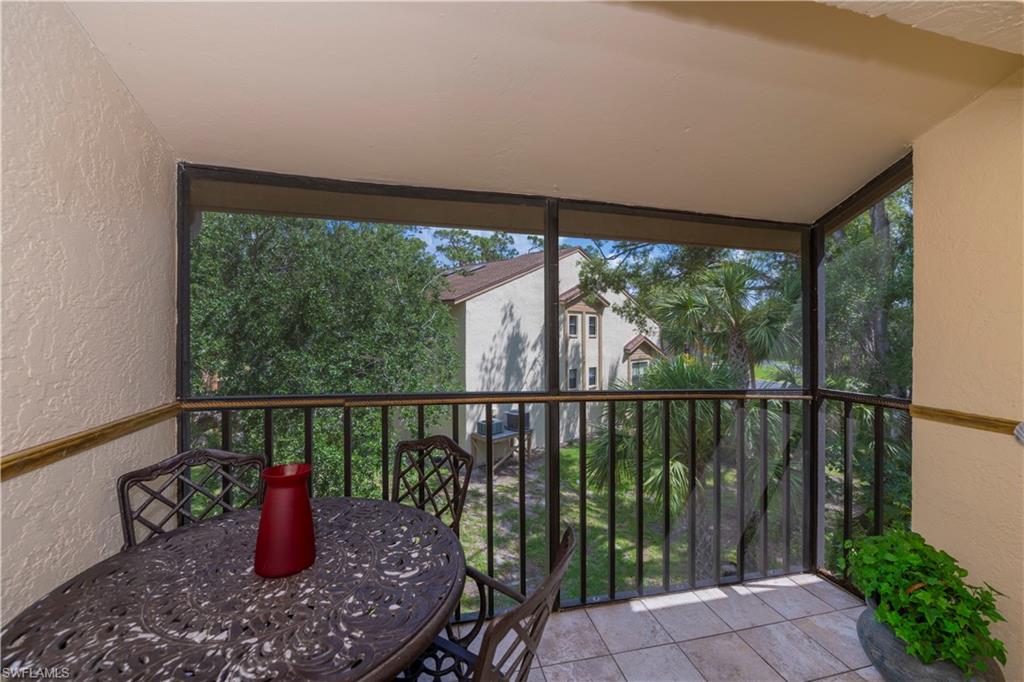 Sunroom / solarium featuring a healthy amount of sunlight