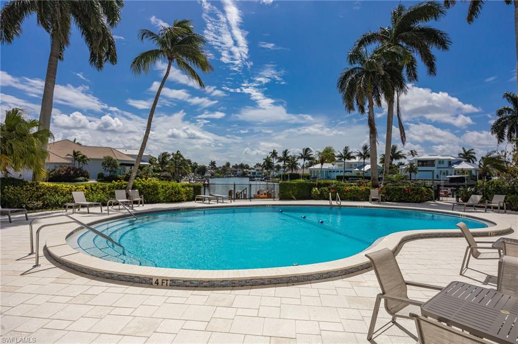 Lounge poolside with a view of the bay