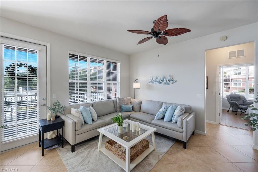 Living space featuring tiled flooring and neutral wall tones