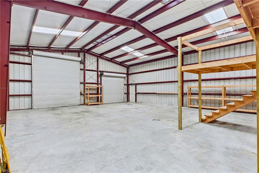 Inside view of 40' x 50' red steel building—ideal for RVs, equipment, vehicles, and much more.
