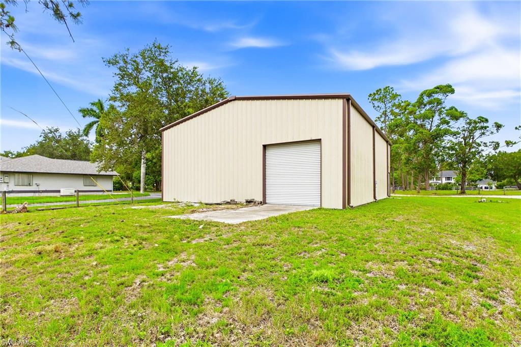Rear view of 40 x 50' red steel building—ideal for RVs, equipment, vehicles, and much more.