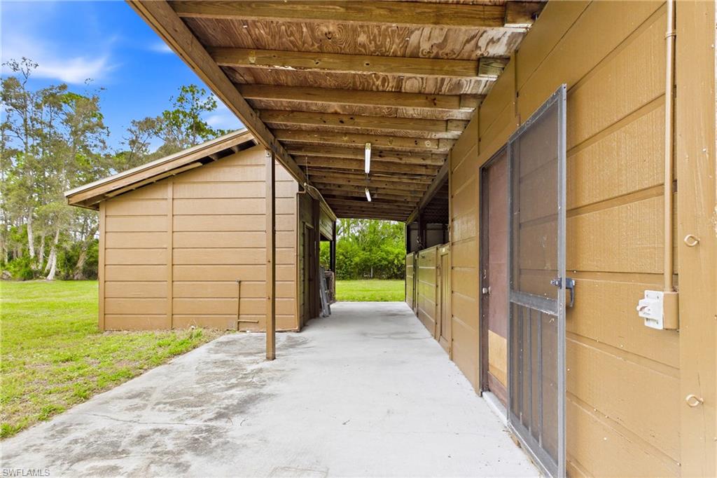 Stable with 2-stall horse barn complete with a tack room, storage room, and a dedicated livestock area.