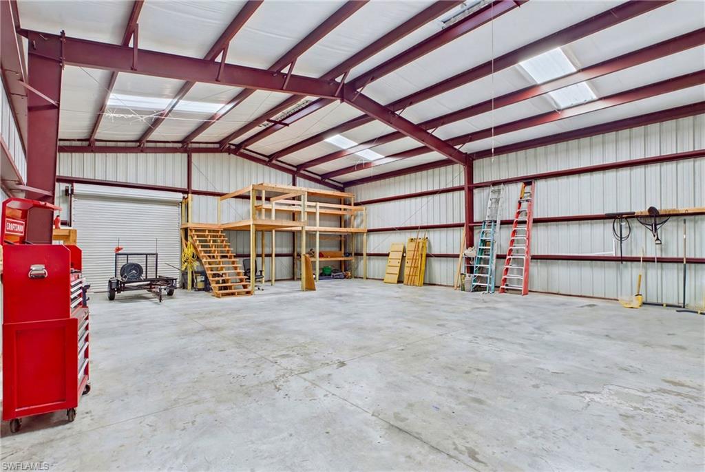 Inside view of 40' x 50' red steel building—ideal for RVs, equipment, vehicles, and much more.