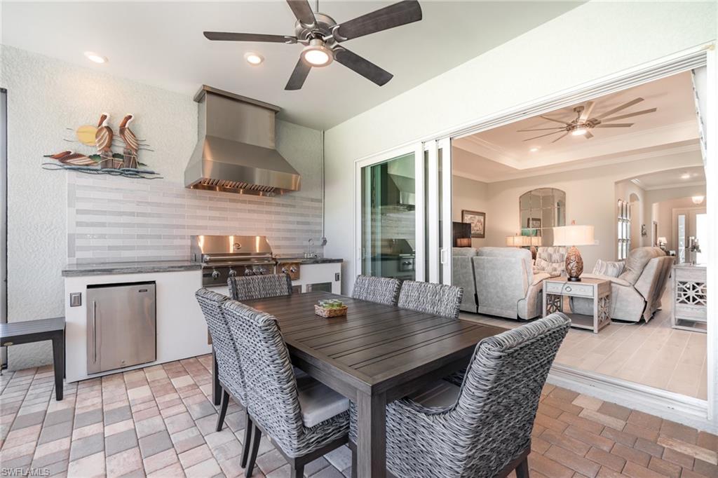 Large screened in lanai with outdoor patio.