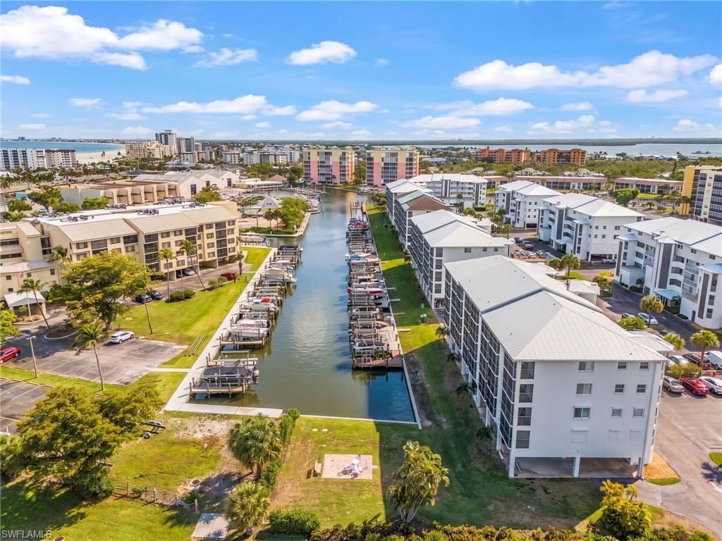 Waterfront community featuring multiple multi-story residential buildings
