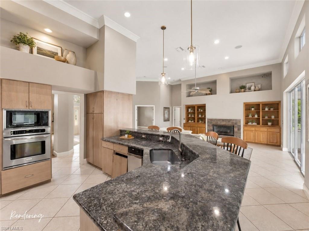 One possible renovation concept for the kitchen, showcasing how thoughtful design updates can elevate this expansive space into a true entertaining showpiece.