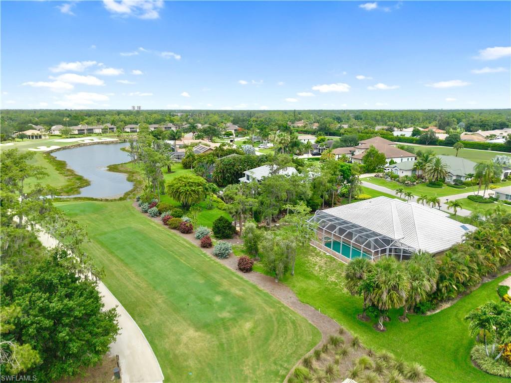 Unlike many golf course properties, this homesite offers a remarkable sense of privacy with mature native vegetation and a natural wooded backdrop bordering the golf cart path, providing peaceful golf course views without the feeling of neighboring homes directly behind you.