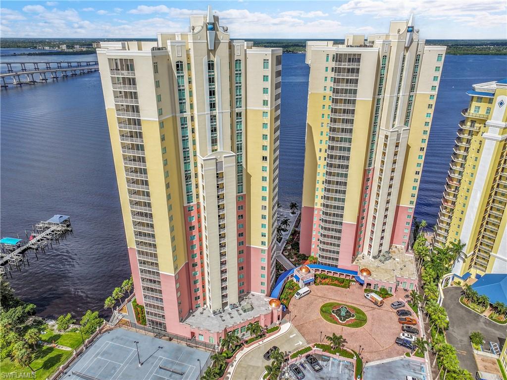 View of apartment building / complex with a water view