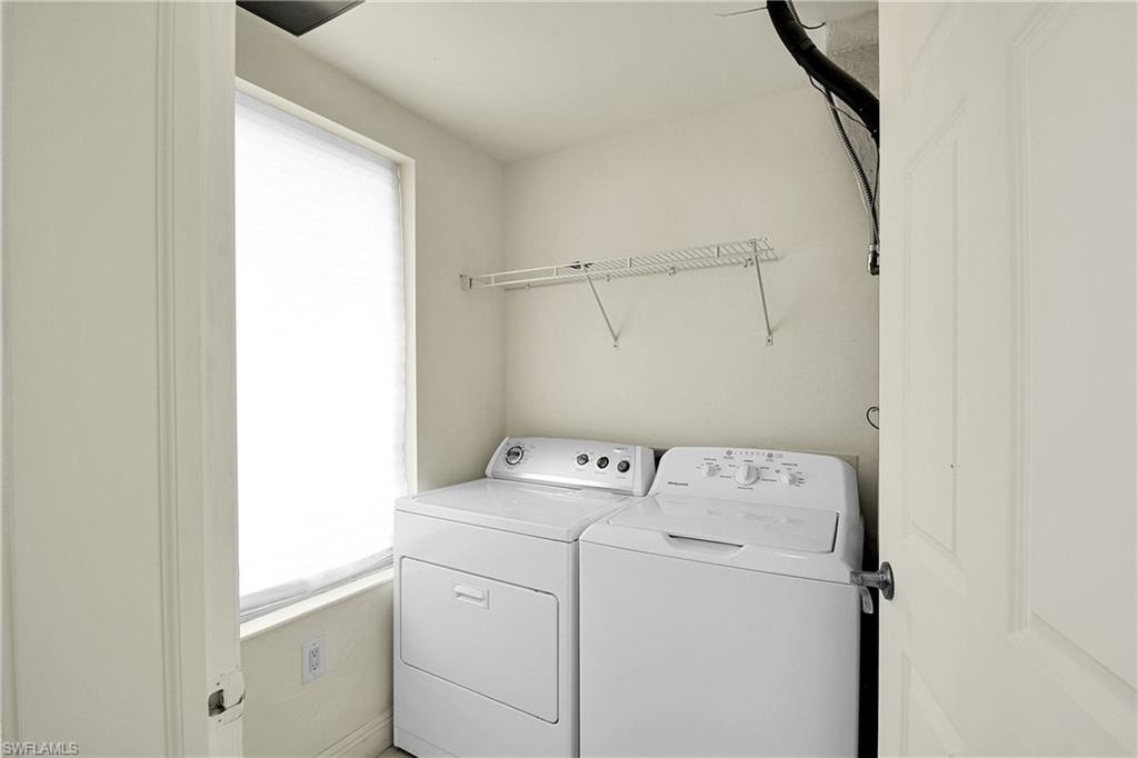Laundry room with washer and dryer