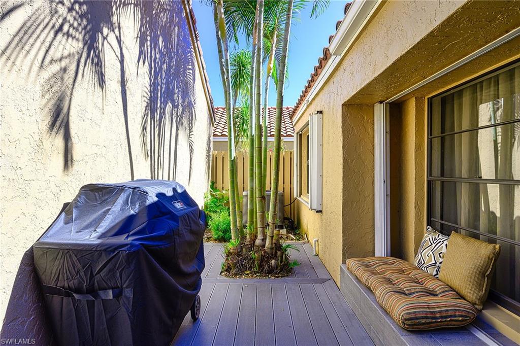 front patio and sitting area with grill