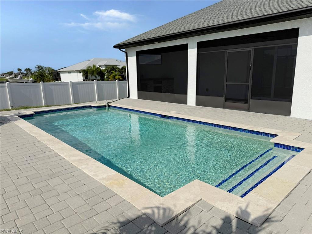Pool with Outdoor Shower. Fenced Yard. Huge Patio Area.