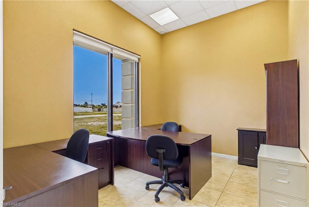 Flexible floor plan featuring private offices and open areas, offering versatility for a wide range of commercial uses.