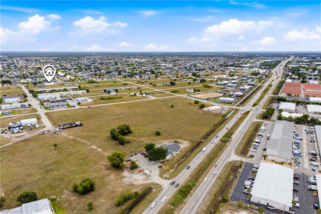 Surrounded by expanding residential communities and commercial development, this property is positioned in one of Cape Coral's most promising growth areas.