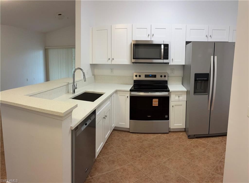 newer appliances, upgraded cabinets