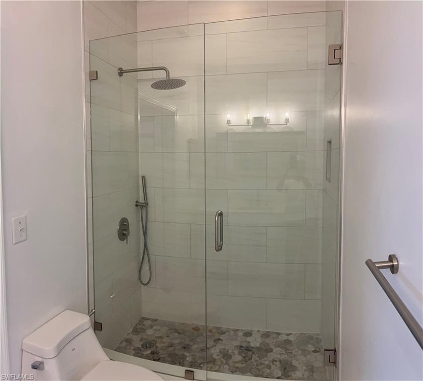 walk in shower newly tiled and remodeled