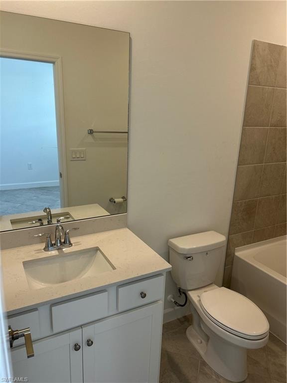 Contemporary bathroom featuring a white vanity with a light-toned countertop, an undermount sink, and a framed mirror