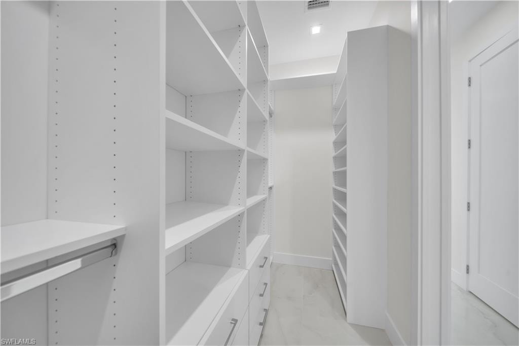 Primary Bedroom Walk-in Closet