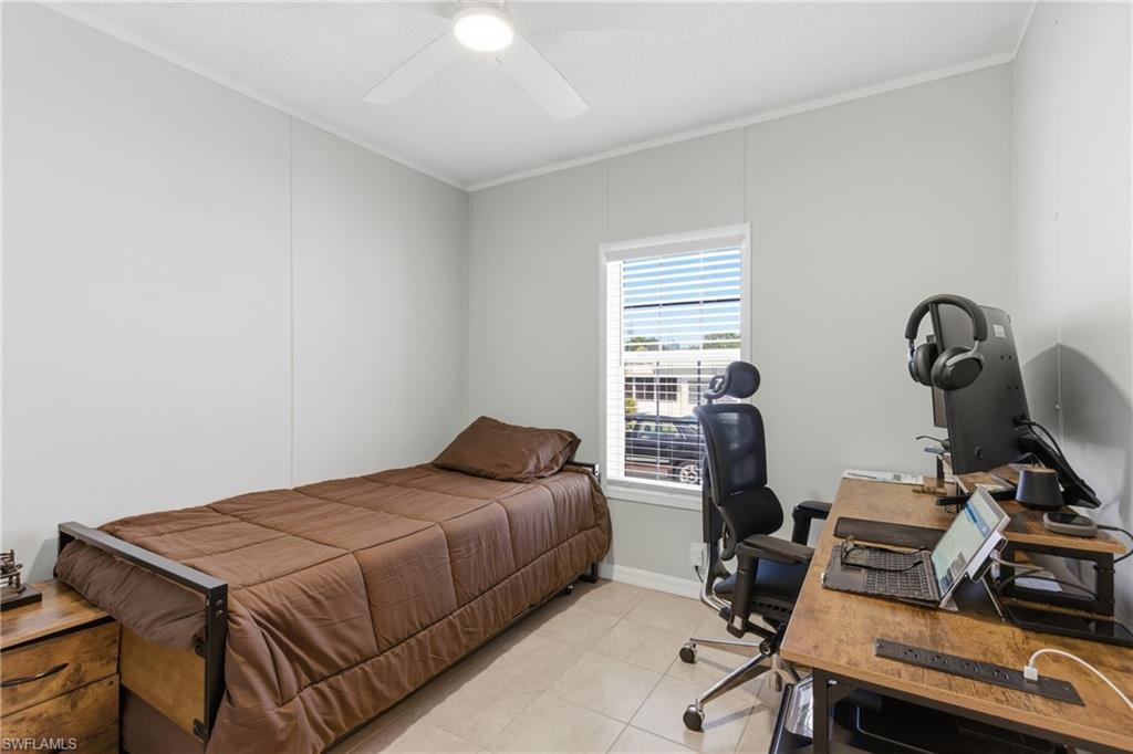 Room featuring neutral wall tones and tile flooring