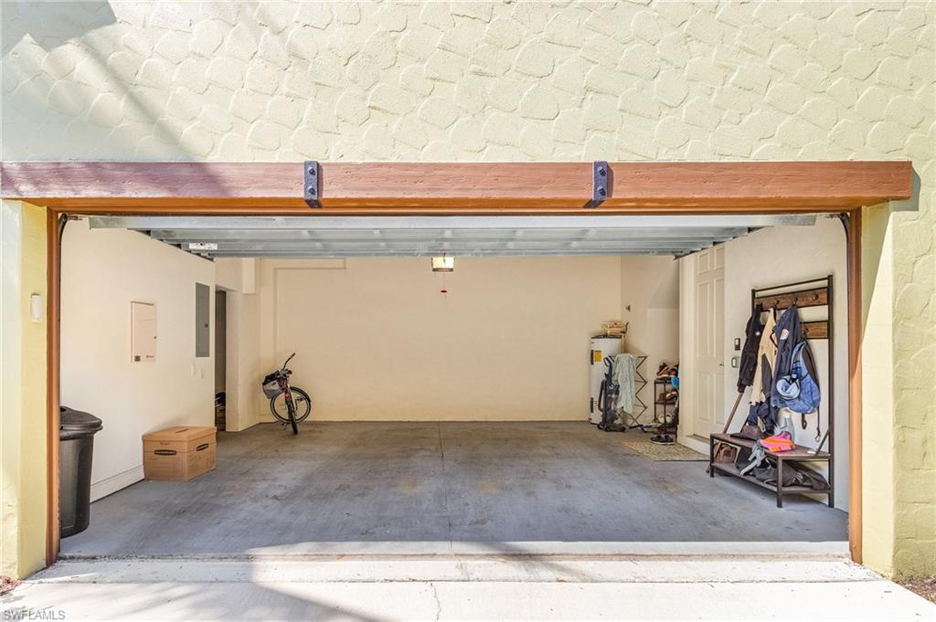 Garage with electric panel and water heater