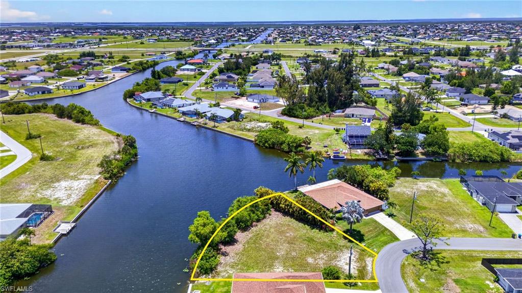 Expansive canal-front lot featuring direct water access