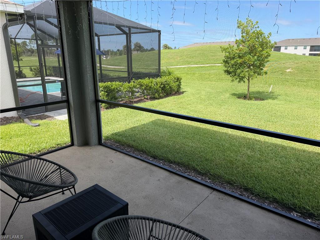 Screen lanai with view of the golf course