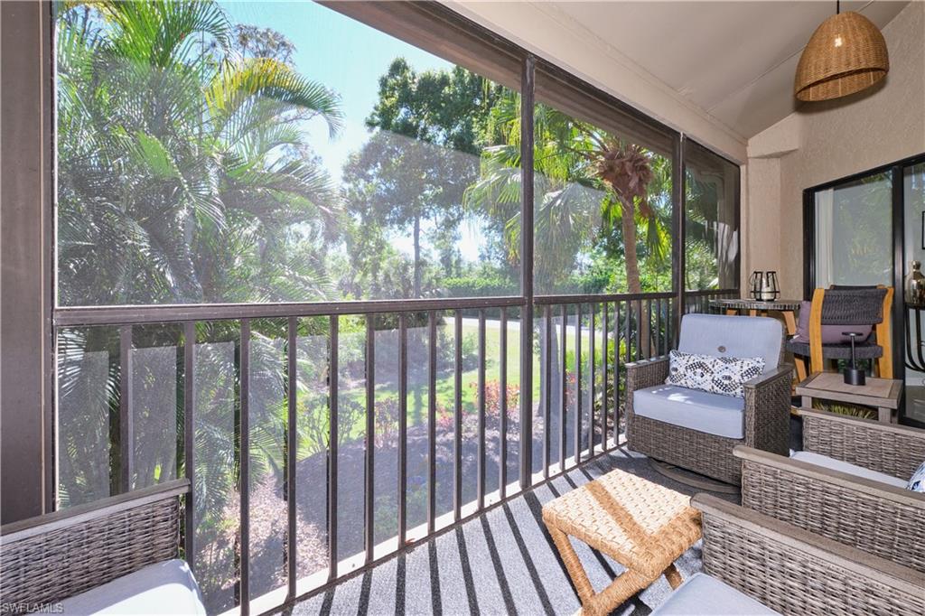 Screened lanai with lovely landscape views.
