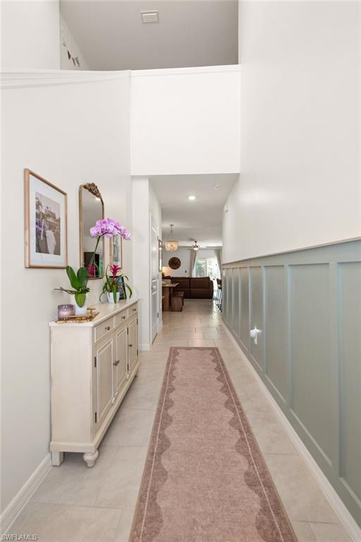 Decorative molding has been added to the entry hallway