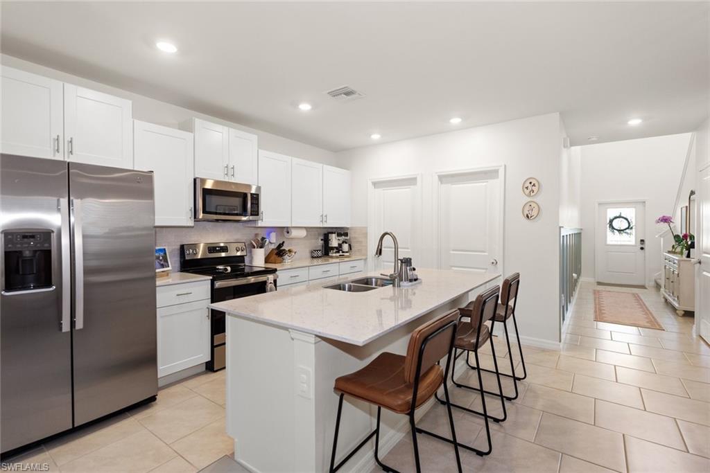 Kitchen has been updated with a lovely backsplash