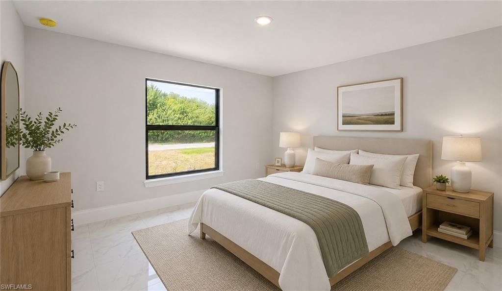 Spacious bedroom featuring light-toned walls, recessed lighting, a large window with black framing, and a light-toned tile floor