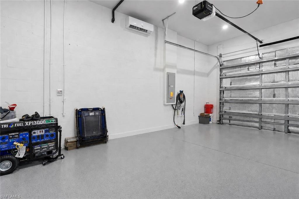Generator, mini-split AC unit, insulation, and epoxy floor.