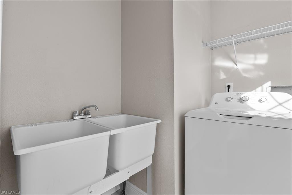 Laundry area featuring washer / dryer