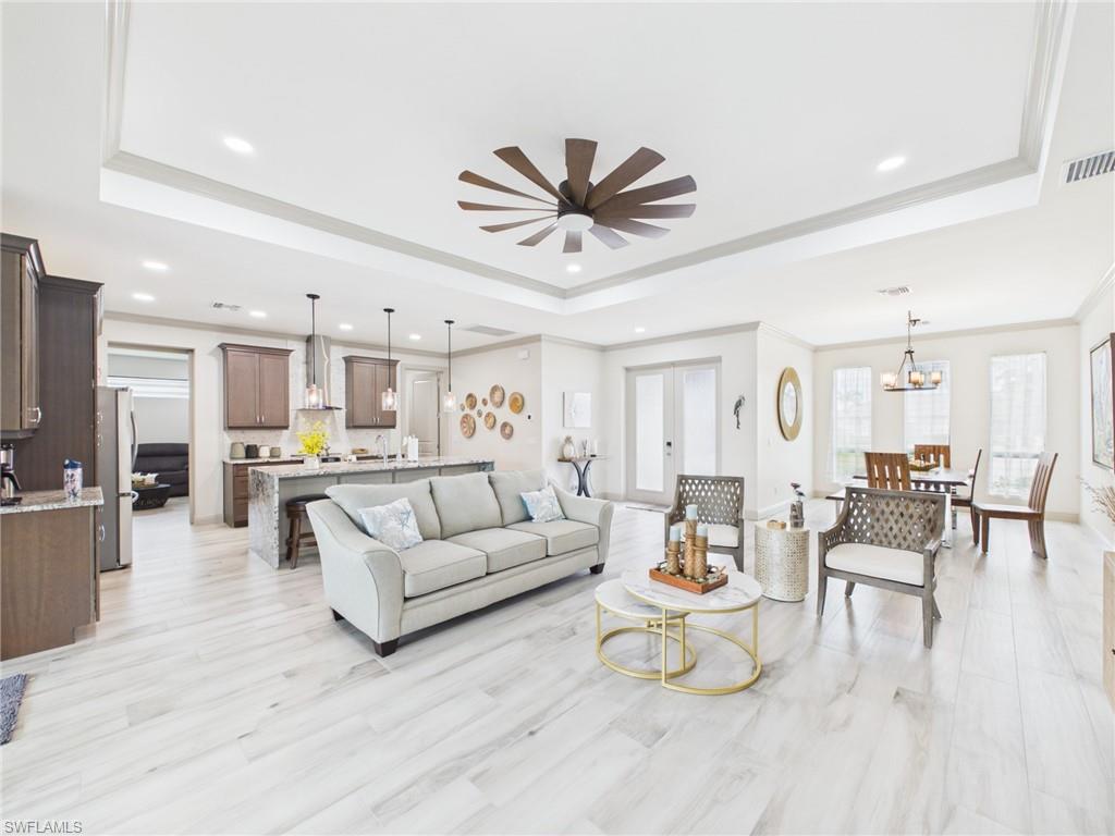 Open concept living area featuring light wood-finish flooring throughout