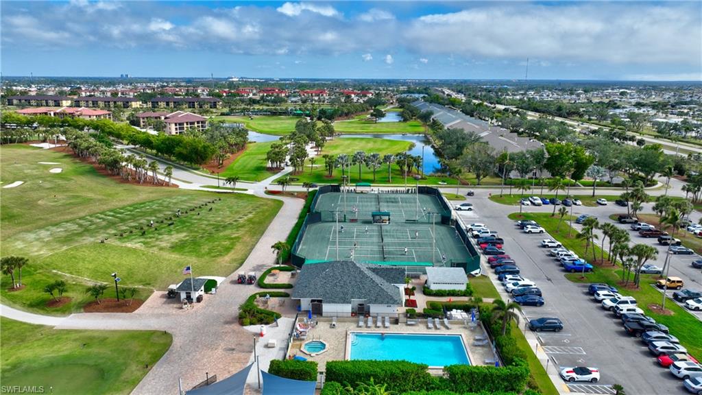 Main pool / snack stand / driving range / tennis courts