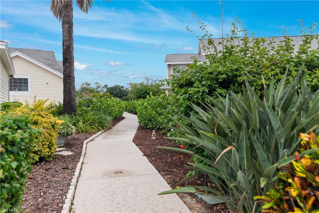 walkway across from the pool to the one mile paved lake to walk or ride bikes