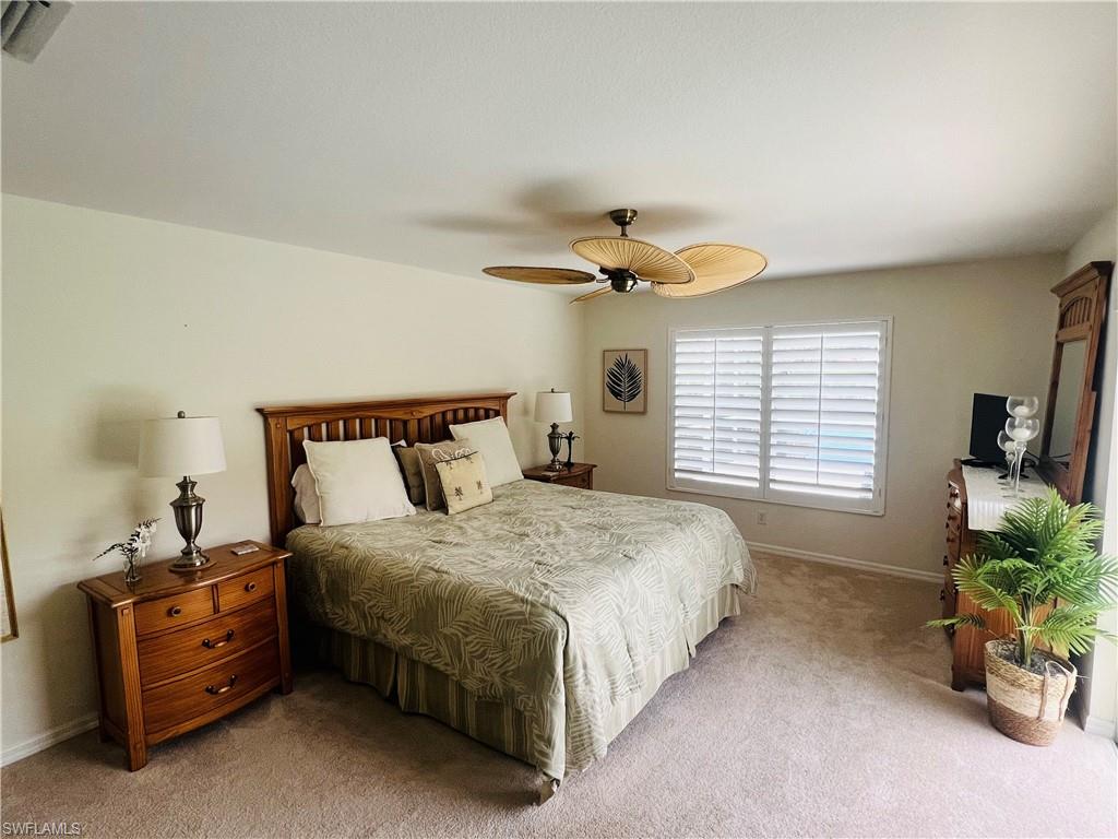 Second Master Suite Carpeted bedroom with ceiling fan