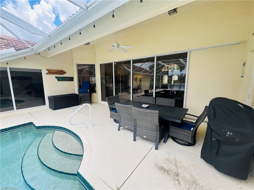View of patio with ceiling fan