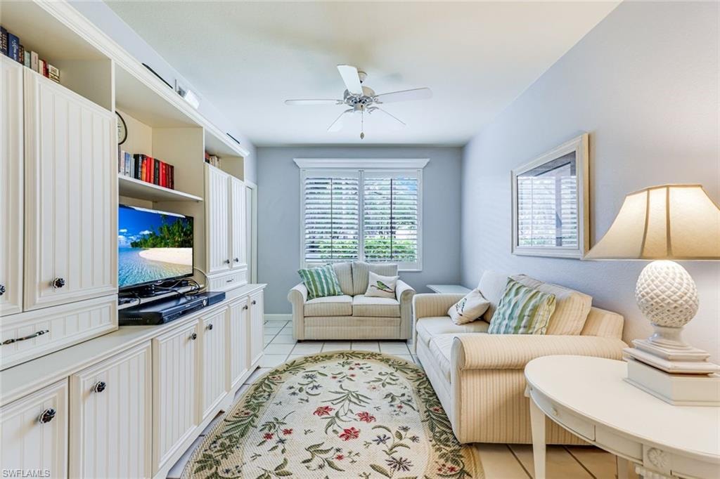 MIDDLE BEDROOM/ TV ROOM WITH COUCH AND LOVE SEAT
